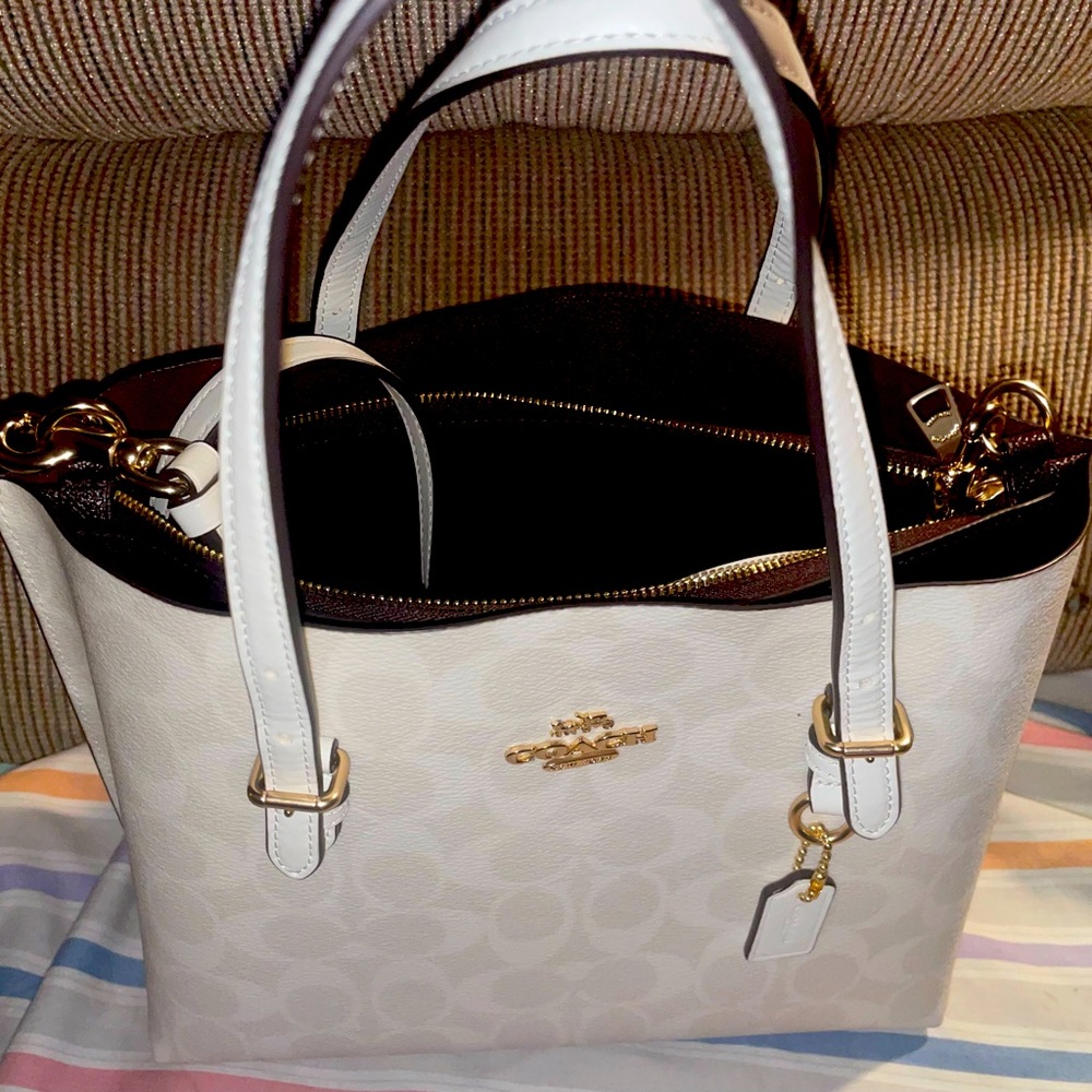 Brand new Coach bag.